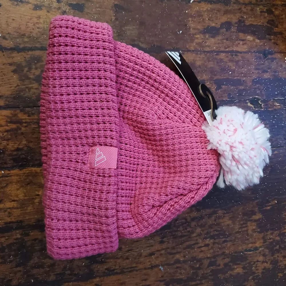 Adidas Youth Pom Ballie beanie in the color Pink Fusion/White. msrp $24